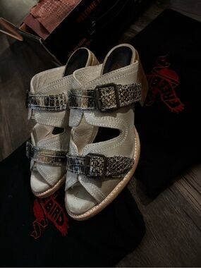 freebird caprice ice mule size 10.  Soft leather with a boot heel.